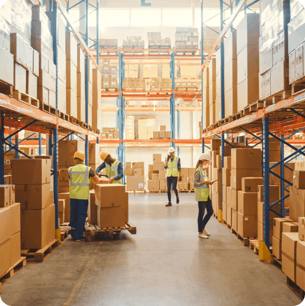 Warehouse workers managing inventory.